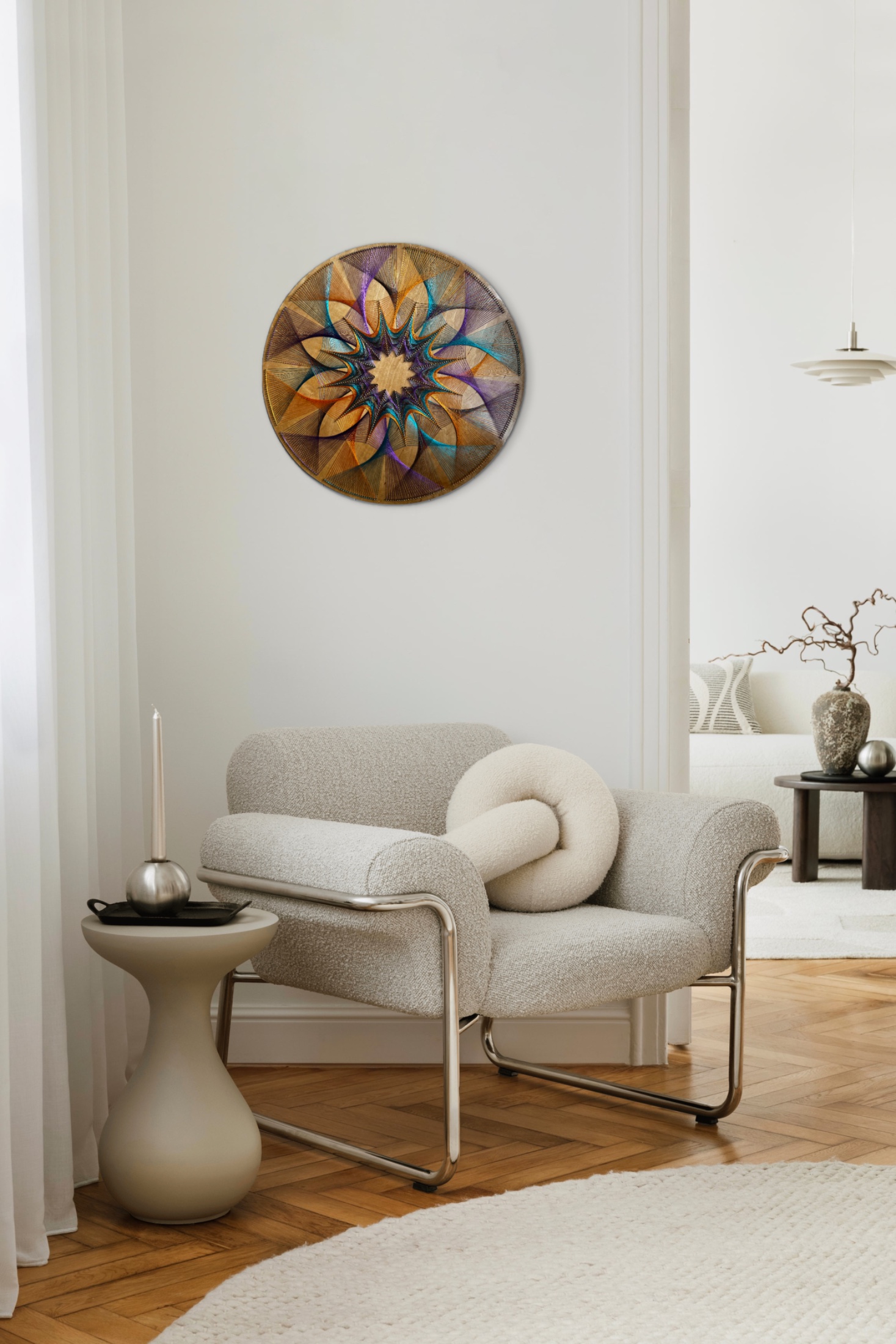 Colorful sacred geometry string art displayed in a bright modern interior